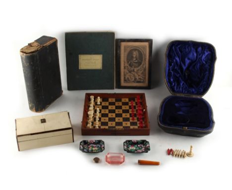 Property of a lady - a late 19th / early 20th century mahogany cased carved natural &amp; red stained bone chess set, three p