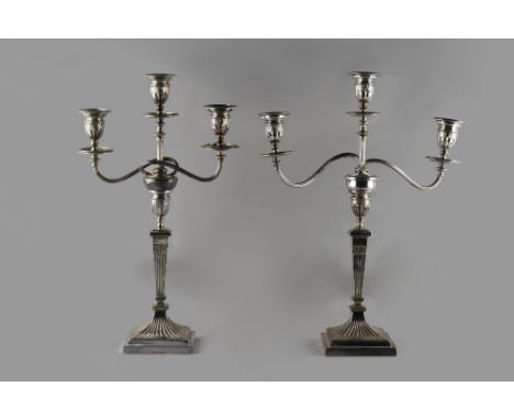 Property of a deceased estate - a pair of Elkington &amp; Co. silver plated neo-classical three light candelabra, each approx