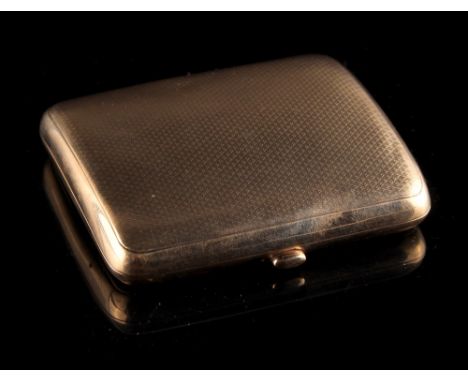Property of a lady - a 9ct gold cigarette case, with engine turned decoration, 3.15ins. (8cms.) long (see illustration). 