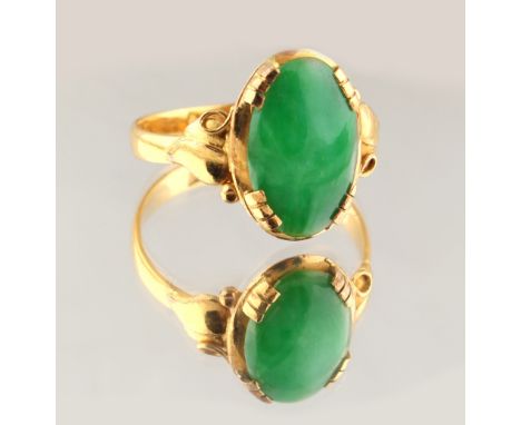 A Chinese high carat yellow gold oval jadeite ring, Chinese marks to shank, size K (see illustration). 