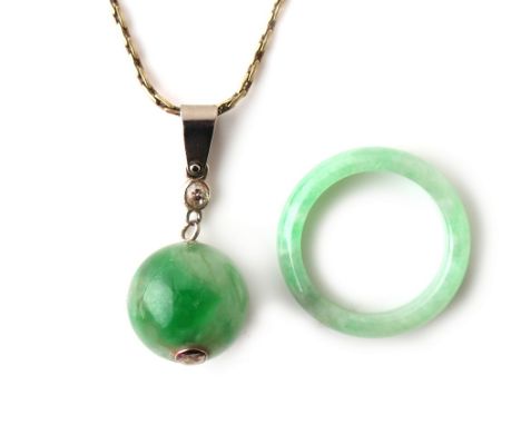 Property of a lady - a Chinese jadeite bead pendant on white metal (probably white gold) chain necklace, the jadeite bead mea