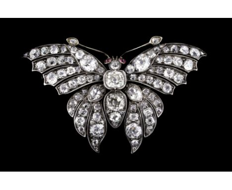 A good Victorian diamond butterfly brooch, circa 1860, set with Old European and single cut diamonds, the estimated total dia