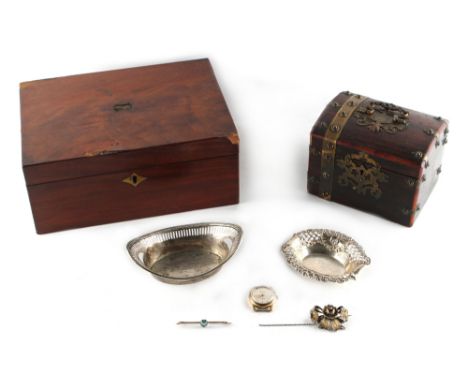Property of a lady - a bag containing assorted items including two silver pierced bonbon dishes &amp; two brooches; together 