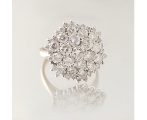 Property of a lady - an 18ct white gold diamond cluster ring, the estimated total diamond weight 2.72 carats, approximately 7