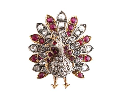 A yellow gold ruby &amp; diamond peacock brooch, circa 1890, with round cut rubies &amp; rose cut diamonds, 1.3ins. (3.3cms.)