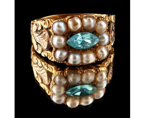 Property of a deceased estate - a Georgian 18ct yellow gold ring set with a navette shaped pale blue stone, probably an aquam