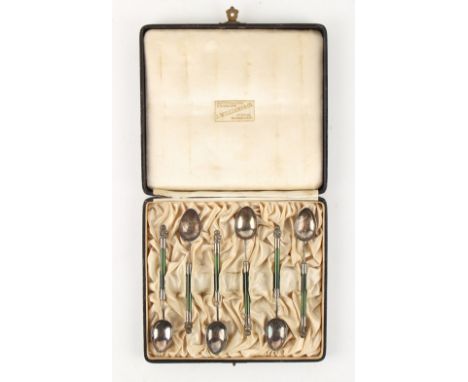 Property of a lady - an ealy 20th century cased set of six Maori white metal &amp; nephrite jade coffee spoons, with tiki ter