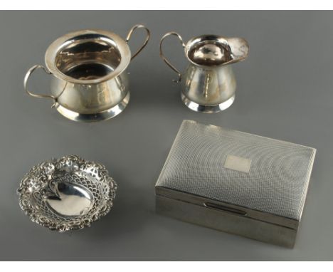 Property of a lady - an Edwardian silver cream jug and matching sugar basin, Birmingham 1909/10; together with a silver cigar