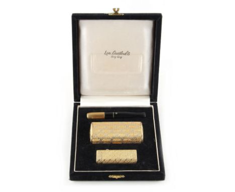 Property of a lady - for Lane Crawford, Hong Kong - an Italian 18ct two-colour gold cigarette box, matching lighter and cigar