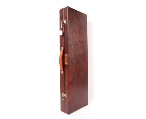 A good vintage 20th century leather style shotgun case - fitted beize interior, with storage compartment. Some elements of pe