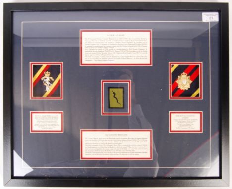 A WWII Second World War interest REME cap badge / patch display. To include cap badge for REME ( Royal Electrical &amp; Mecha