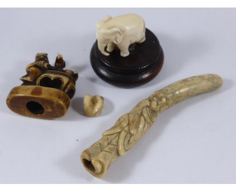 NETSUKE DEPICTING A SAGE, ONE OTHER AND A CARVED IVORY ELEPHANT ON WOODEN PLINTH