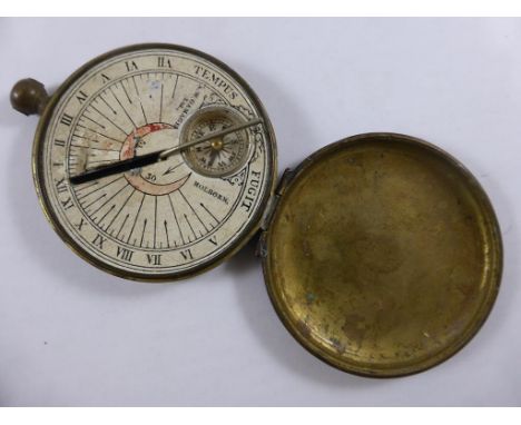 A CIRCULAR POCKET SUN DIAL AND COMPASS BY A.W. GAMAGE LTD. WITH IVORY NOTEPAD BACK IN THE FORM OF A POCKET WATCH