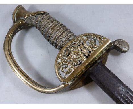 GERMAN OFFICER'S DRESS SWORD WITH PIERCED AND FOLDING HILT, ARMORIAL DECORATION, WIRE BOUND FISH SKIN GRIP, FULLERED BLADE WI