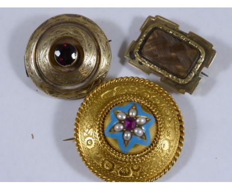 HAIR MOURNING LOCKET BROOCH, GOLD CIRCULAR BROOCH WITH BLUE ENAMELLED CENTRAL BOSS SET WITH PEARLS A RUBY AND ONE OTHER SET W