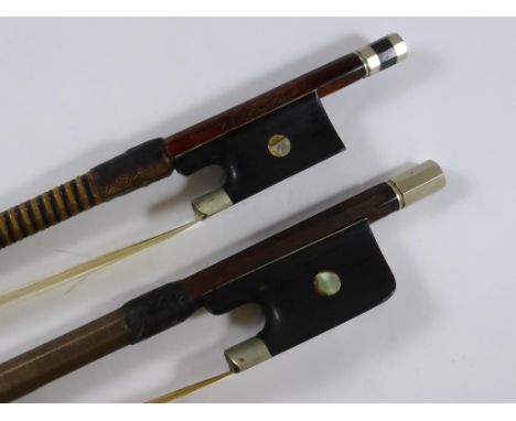 2 VIOLIN/ VIOLA BOWS, ONE STAMPED C.H.BUTHOD PARIS WITH ROUND STICK, MOTHER OF PEARL INLAID EBONY FROG WITH MOTHER OF PEARL E