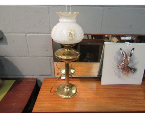 A modern brass oil lamp style table light with glass moulded shade, 70cm tall