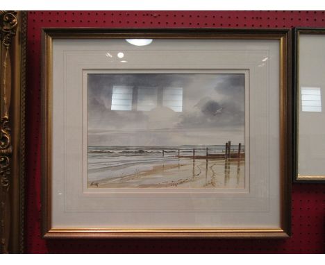 GRIFF GRIFFITHS: A watercolour of seascape beach, seagull's in flight, framed and glazed, 26cm x 36cm