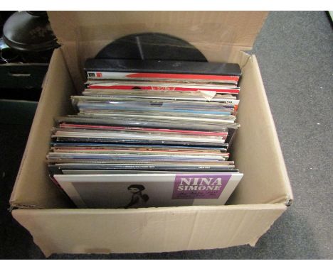 A collection of assorted LP's and 78's including Motown compilations, Cliff Richard, The Carpenters, Bread, The Everly Brothe