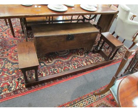 A 19th Century oak club fire fender with stool end seats on turned supports, 46cm x 153cm x 38cm  