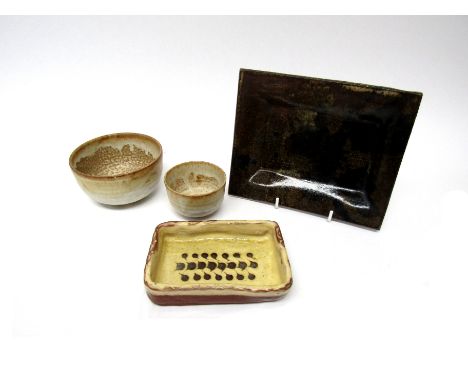 A Winchcombe Pottery rectangular dish with slip decoration, impressed WP pottery mark to base; with two studio pottery small 