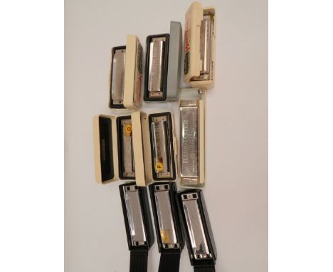 Bag containing a quantity of harmonicas including Hohner