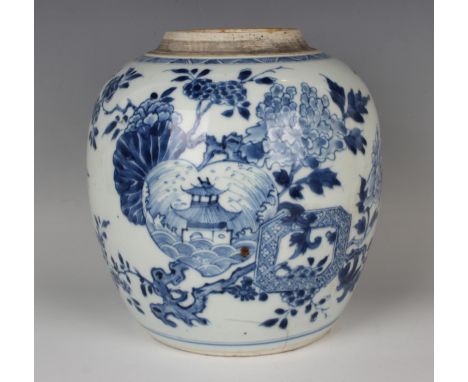 A Chinese blue and white porcelain ginger jar, 18th century, of stout ovoid form, painted with a peach shaped panel amidst pe