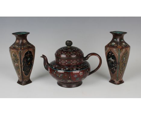 A Japanese cloisonné teapot and cover, Meiji period, of squat circular form, decorated with dragon and foliate bands above bu