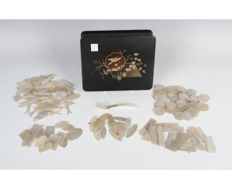 A collection of Chinese Canton export mother-of-pearl gaming counters, mid to late 19th century, comprising sixty-four variou