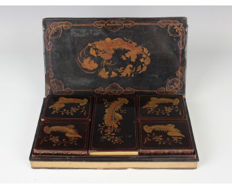 A Chinese export lacquer rectangular counter box and cover in the form of a book, mid-19th century, the interior fitted with 