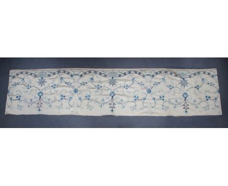 A Chinese silk embroidered rectangular altar panel, late Qing dynasty, worked in shades of blue threads with a formal design 
