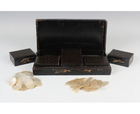 A large collection of Chinese Canton export mother-of-pearl gaming counters, mid-19th century, comprising forty-five large fi