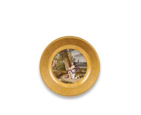 A Sèvres gold-ground plate with classical figures painted by Drolling, circa 1804-1805Depicting a classical scene of Cupid an