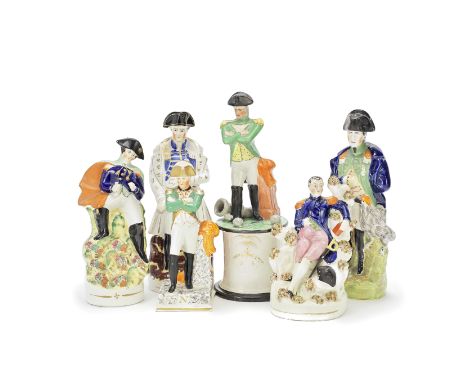 Six Staffordshire figures of Napoleon, mid-19th centuryComprising a porcellaneous figure of Napoleon standing on a square bas