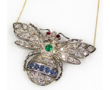 An 18ct gold diamond sapphire emerald and ruby bee shaped pendant necklace, on a slender link chain, 6cm wide.