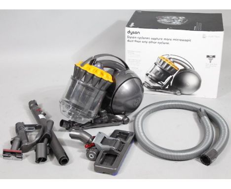 A Dyson DC28C Roller Ball Cyclone multi floor vacuum cleaner, with accessories. (boxed)