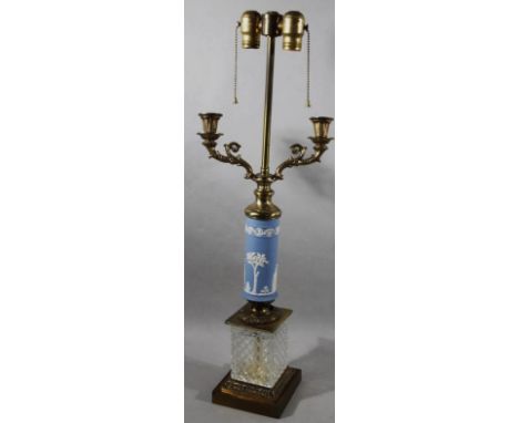 A Wedgwood blue Jasperware brass and cut glass two branch table lamp, with various fittings, (wiring removed), 75cm high.