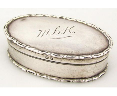 An Edwardian silver snuff box, of oval form with a raised outline, initialled to the centre, Birmingham 1905, 9cm wide, 2oz.