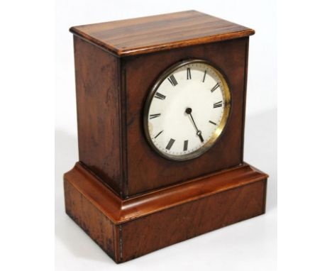 A late 19thC walnut cased mantel clock, the square case with 9cm dia. Roman numeric dial with pendulum driven movement, 20cm 