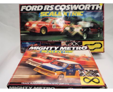 Scalextric Mighty Metro set and Ford RS Cosworth set 