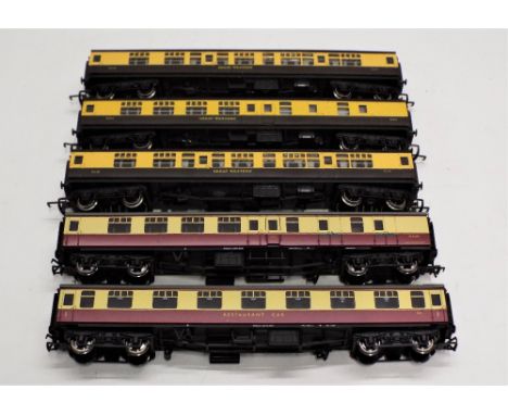 Three Hornby 00 Great Western coaches and two 00 Bachmann coaches 