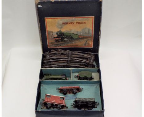 Boxed Hornby 0 gauge vintage clock work train set with LNER green locomotive 1842 rolling stock and track in original box 