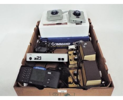 Collection of train controllers, Dynamis command station, two gauge master model D transformers, Fleischmann Z21 control cent