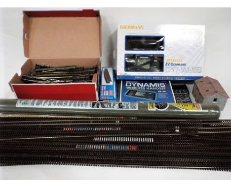 Large collection of 00 gauge track and points, mostly straights, rolls of scenery, a Bachmann wireless DCC model rail road co