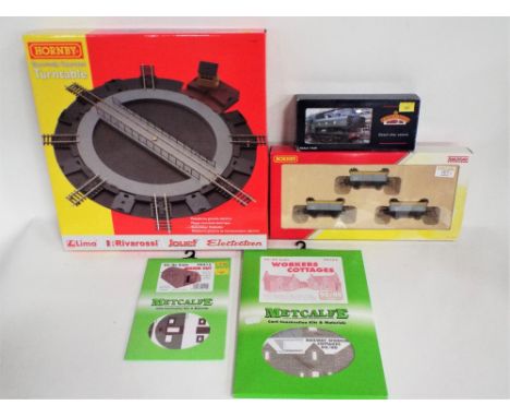 Collection of 00 gauge rolling stock and accessories, Hornby electrically operated turn table (unopened), two card constructi