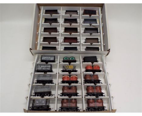 Thirty 00 gauge mineral wagons, brake van, cement wagon etc by Dapol, Hornby, and Bachmann