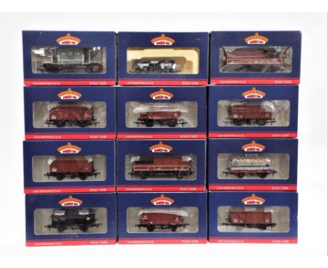 Twelve Bachmann 00 gauge boxed rolling stock, ventilated fruit van, mobil tanker, brake van, 5 plank wagon etc