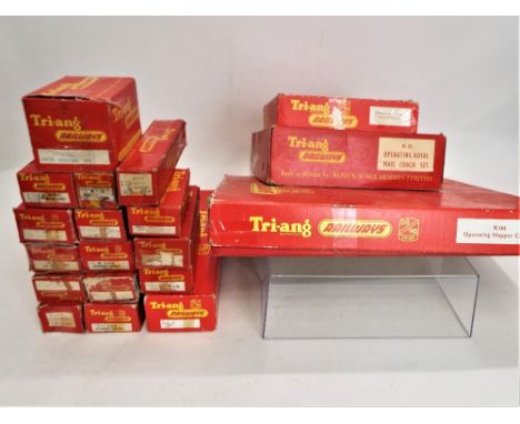 A collection of Triang 00 gauge boxed railway coaches, wagons, Royal Mail coach set, operating hopper car set, level crossing