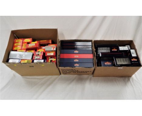 Three containers of empty model railway boxes, mostly Bachmann and Hornby