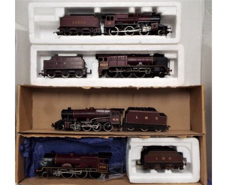 Three 00 gauge steam locomotives with tenders and one Bachmann locomotive with tender missing wheels (only the Lima locomotiv